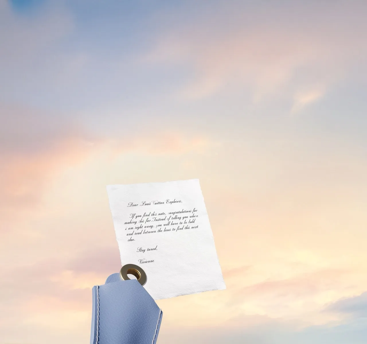 Hand holding a folded handwritten letter card against a soft pastel sky for Louis Vuitton — 3d product visualization Thinkdiff, photography & art direction by Thinkdiff AI Production House