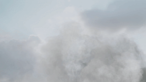 Animated polaroid photograph of the Eiffel Tower floating above soft clouds — cgi studio Thinkdiff, photography & art direction by Thinkdiff AI Production House